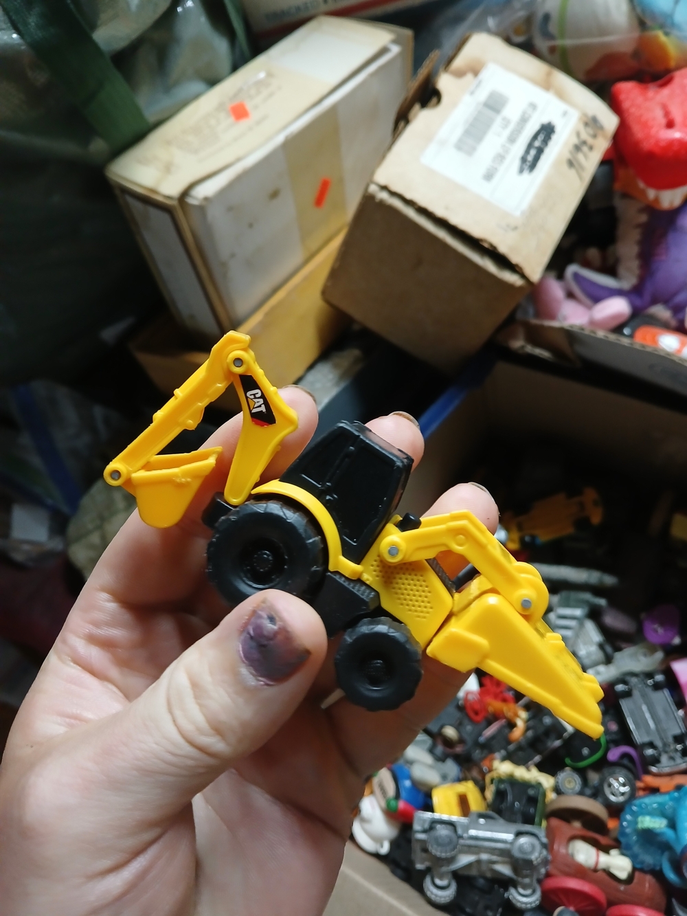 free-wheeling CAT Mini Machine Backhoe Loader Toy State